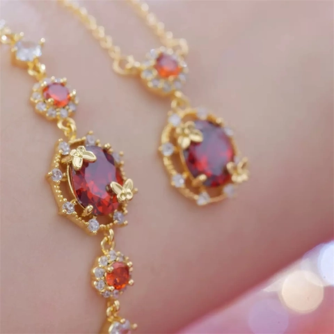 Elegante Collana Orecchini Bracciale Rame Placcato Oro 18K Zircone Ovale Rosso Farfalla Perno In Argento Per Donna