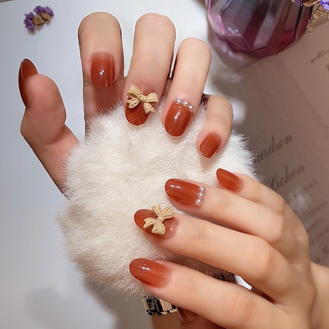 Amber Gradiënt Glanzende Kunstnagels Met 3D Strik En Kunstpareldecor Elegante Mode Kunstmatige Vingernagels Voor Dames