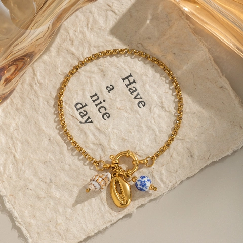Goldfarbenes Edelstahlarmband Mit Naturmuschel Und Floraler Keramikperle Ozean Stil Wasserdicht Schmuck Für Damen
