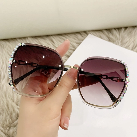 Lunettes de Soleil Papillon Sans Monture pour Femmes Branche Chaîne Strass Verres Dégradés Mode Protection UV400