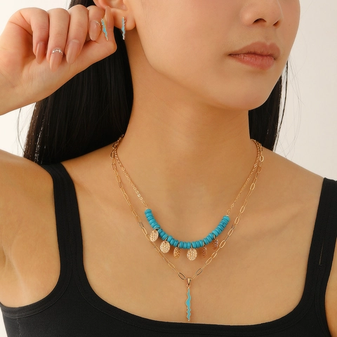 Boho Legierung Vergoldet Schmuckset Mehrlagige Halskette Und Wellenförmige Ohrringe Türkis Perlen Geometrische Anhänger Damen Schmuck