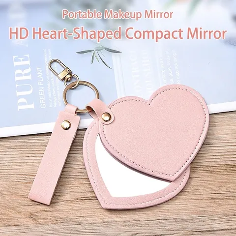 Espejo De Maquillaje Portátil Forma Corazón Cuero PU Espejo De Bolsillo Plegable Llavero Accesorio De Bolso Para Mujeres