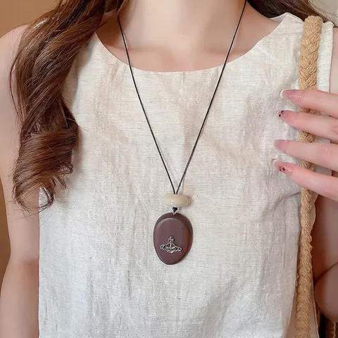 Collana Lunga Pendente Legno Acrilico Lega Ovale Saturno Perla Beige Cordino Nero Retrò Minimalista Donna