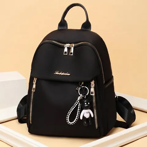 Damen Mode Rucksack Wasserdicht Oxford Tuch Lässig Reise Schultasche Mit Gold Reißverschluss Und Süßem Bärenanhänger