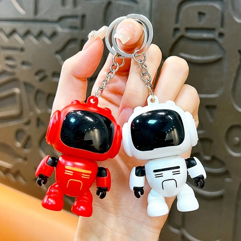Cartoon Luminous Spaceman Robot Keychain Rotating Stress Relief Toy Astronaut School Bag Pendant Car Key Ring Gift