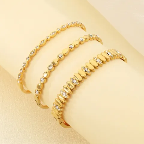 Bracciale Rigido Di Moda In Acciaio Inossidabile Placcato Oro 18K Geometrico Ovale Foglia Zircone Inlay Lusso Da Donna