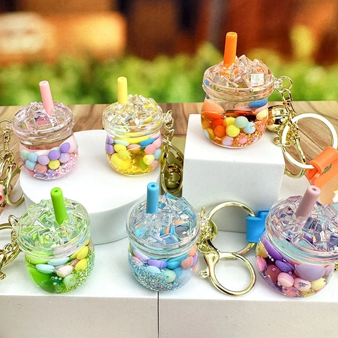 Portachiavi Creativo a Tazza di Tè al Latte con Sabbia Mobile Liquida Simpatico Ciondolo Borsa con Perline Colorate per Coppie