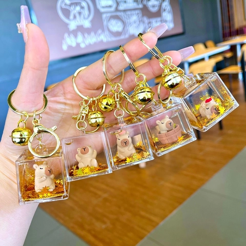 Creative Cartoon Capybara Liquid Quicksand Cube Keychain Transparent Acrylic Animal Doll Bag Pendant With Gold Bell