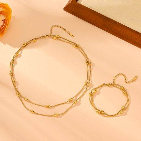 Gioielli Collana E Bracciale A Strati In Acciaio Inossidabile Placcato Oro Perline Ovali Catena A Serpente