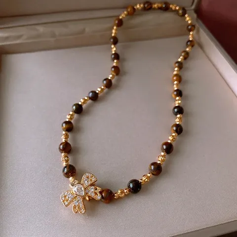 Tiger Eye Beaded Necklace With Gold Plated Copper Bowknot Pendant Zircon Inlaid Vintage Maillard Style For Women