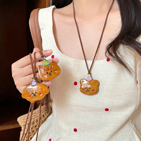 Joli Collier Pendentif Ours Chien Dessin Animé Avec Chapeau Fête En Résine Forme Animale Cordon Tressé Bijoux Pour Femmes