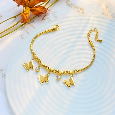 Elegante Bracciale con Ciondolo a Farfalla in Acciaio al Titanio Catena a Serpente Oro Con Pendenti a Farfalla Smerigliata e Strass Donna