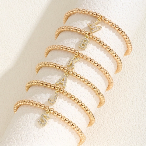 Bracciale Elastico da Donna in Grani d'Oro con Pendente Iniziale dell'Alfabeto in Zirconia Pavé Gioiello Regalo