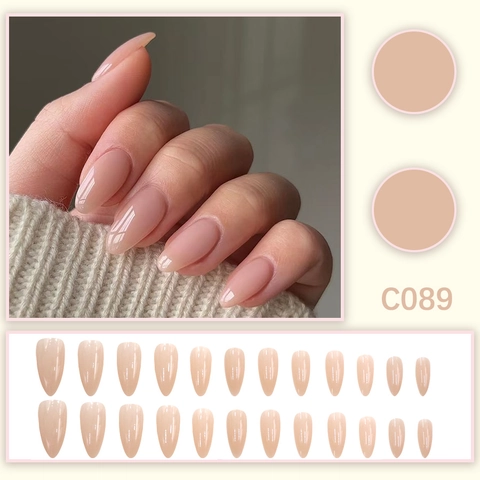 Unghie Finte A Pressione Rosa Nude Forma Mandorla Lucide Trasparenti Minimaliste Eleganti Per Donne