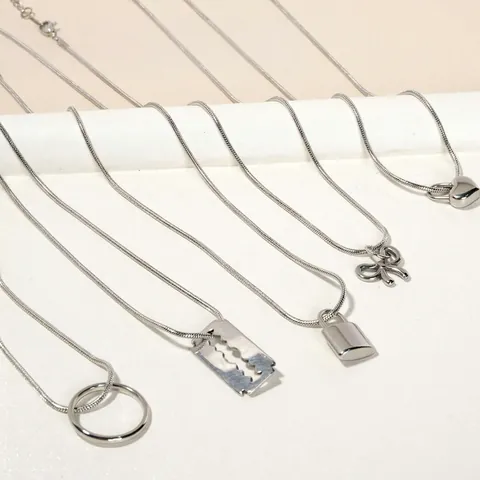 Pendentifs en Acier Inoxydable en Forme de Cœur Nœud Étoile Croix DIY Accessoires de Bijoux Argent pour Collier Femme