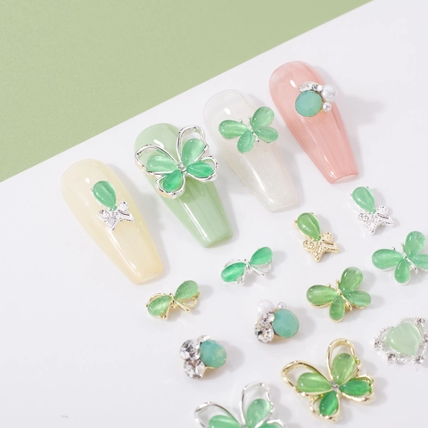Abalorios Para Uñas 3D Aleación Piedra Ojo De Gato Mariposa Lazo Forma De Corazón Pedrería Accesorios De Decoración Manicura DIY