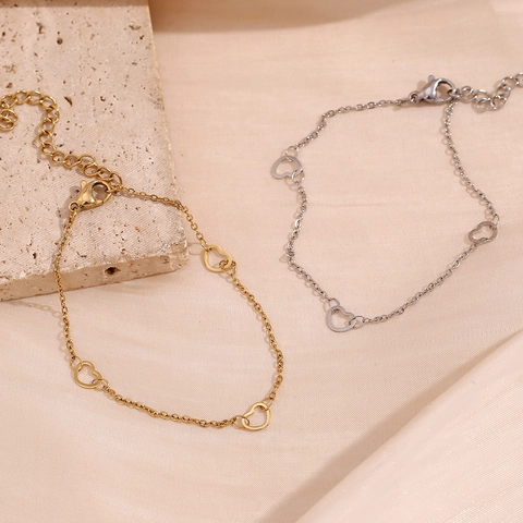 Bracciale Con Cuore Spliced Minimalista Acciaio Inossidabile Placcato Oro 14K Gioielli Cuore Cavo Regolabile Per Donna Design Di Nicchia