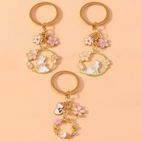 Portachiavi con Corona di Fiori a Forma di Gatto e Coniglio per Donna in Lega di Zinco Oro Strass Pendente di Fiori di Ciliegio