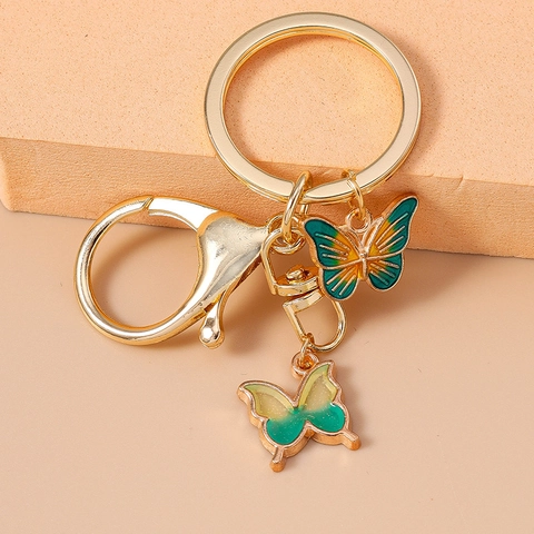 Porte-clés Papillon Créatif en Alliage de Métal Doré avec Pendentif Animal en Émail Dégradé pour Accessoires de Sac à Dos Cadeau