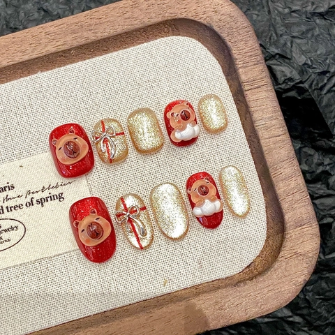 Unghie Finte Fatte A Mano Natale Rosso Oro Glitter 3D Orso Fiocco Occhio Di Gatto Simpatico Cartone Animato Inverno Festivo