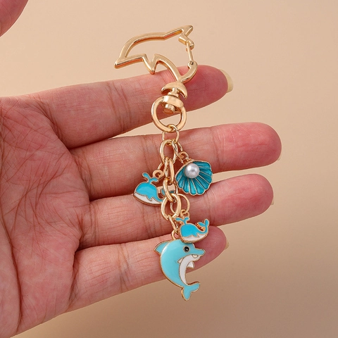 Llavero de Delfín de Dibujos Animados de Moda Colgante de Metal Creativo Vida Marina Concha Estrella de Mar Ballena Pez Esmalte Aleación Mujer