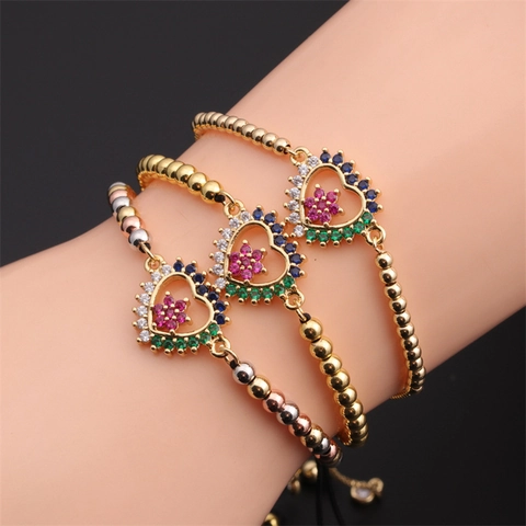 Bracciale In Rame A Forma Di Cuore Con Zirconi Colorati Micro Incastonati Corda Intrecciata Regolabile