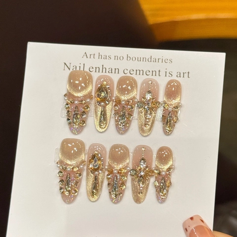 Handgemaakte Press On Nagels Champagnegoud Kattenoog Strass Franse Stijl Luxe Lange Ovale Kunstnagels Voor Dames