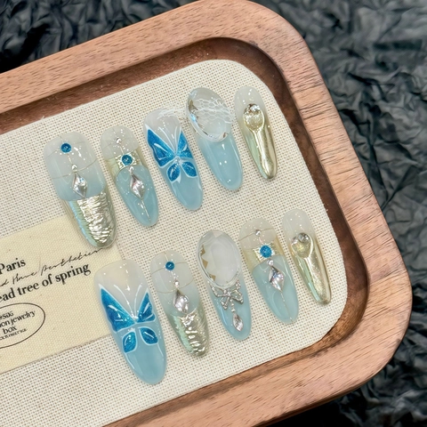 Uñas Postizas A Presión De Mariposa Azul Hechas A Mano Hielo Transparente Rhinestone Almendra Larga Uñas Artificiales Lujo