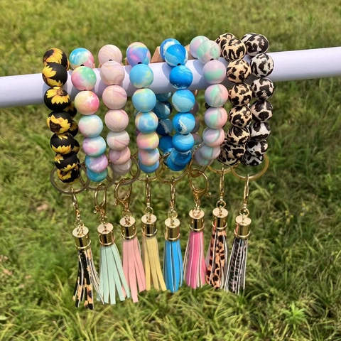 Llavero De Pulsera De Cuentas De Silicona Con Cuenta De Madera Y Borla De Cuero PU Patrón De Leopardo Girasol Para Mujer