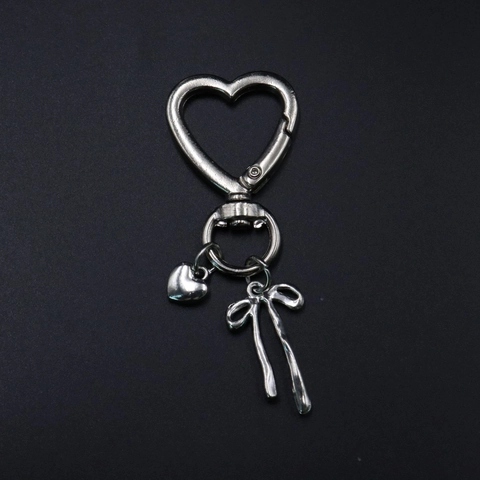 Silberner Metall Schlüsselanhänger Taschenanhänger Herz Stern Form Mit Schleife Spiegel Medaillon Und Quaste Modeaccessoire