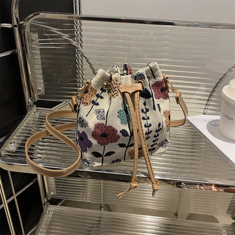 Damen Ethno Gewebte Beuteltasche Vintage Blumen Geometrisches Muster Kordelzug Leinwand PU Leder Verstellbarer Schultergurt