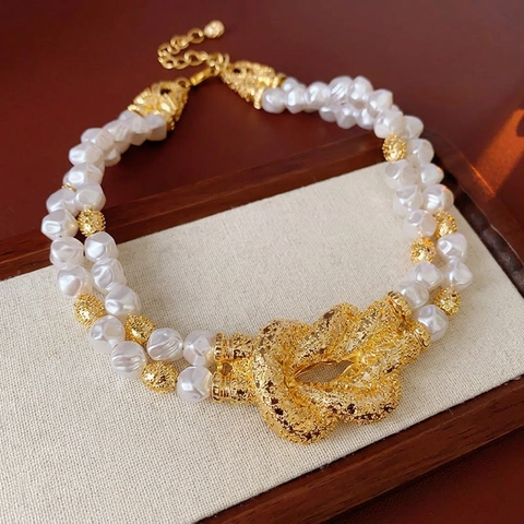 Collana Künstliche Perle D'imitazione A Più Strati Ciondolo Nodo Rame Dorato Testurizzato Choker Retrò Di Lusso