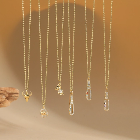 Retro Gold Plated Copper Evil Eye Pendant Necklace For Women Zirconia Inlaid Bull Head Bear Safety Pin Clavicle Chain Jewelry