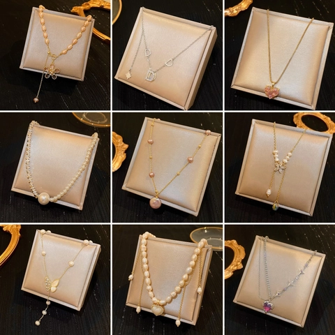 Elegante Süßwasserperlenkette Mit 18K Vergoldetem Legierung Herz Schmetterling Anhänger Zirkon Licht Luxus Schmuck Damen