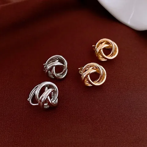 Minimalistische Gedrehte Knoten Creolen Für Damen Kupfer Metall Wicklung Hohl Geometrische Ästhetik Elegant Alltag Mode