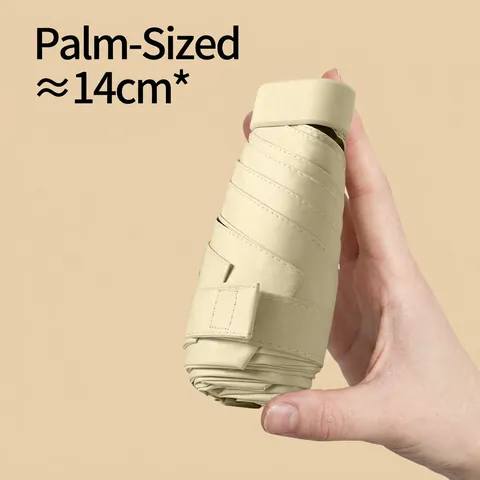 Mini Paraguas Plegable Portátil Alta Protección UV Revestimiento Negro Sol Lluvia Manual Ligero Viaje Bolsillo