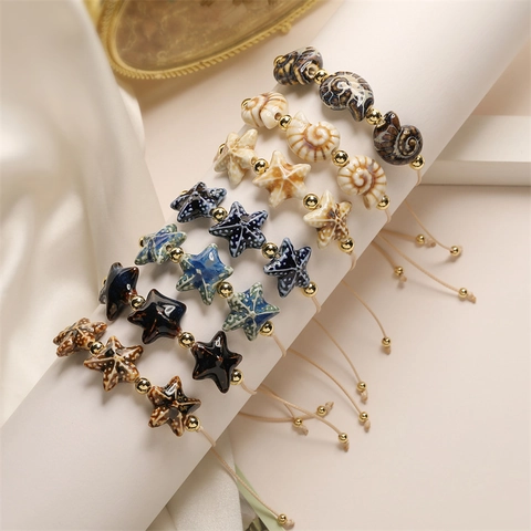 Starfish Snail Beaded Bracelet Handmade Ceramic Beads With Copper Accents Adjustable Braided Rope Bohemian Ocean Style