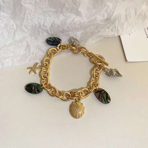 Pulsera Con Dijes De Océano Vintage Aleación Oro Estrella De Mar Concha Cierre De Palanca Cadena Gruesa Joyería De Nicho Vacaciones
