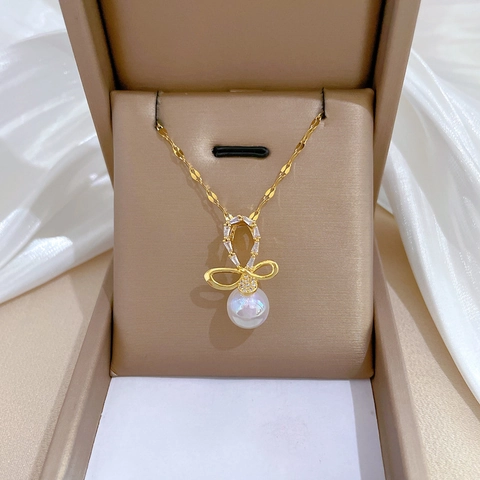 Elegante Collana Con Pendente A Fiocco Catena In Acciaio Inossidabile Ottone Con Zircone Scintillante E Perla Artificial Per Donna