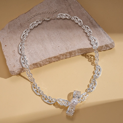 Elegant Hollow Lace Bowknot Pendant Necklace Alloy With Imitation Artificial Pearl Niche Style Fashion Accessory For Women