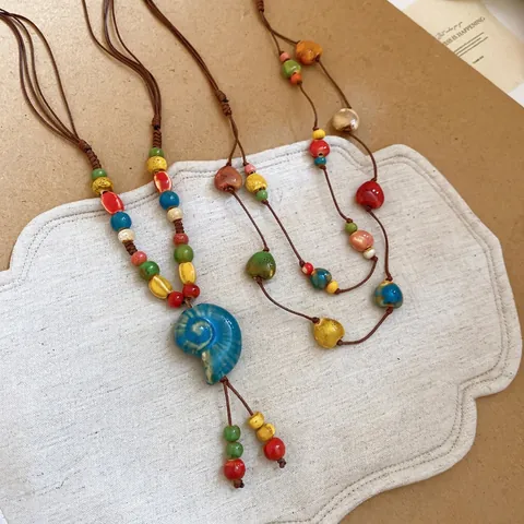 Mehrlagige Boho Halskette Handgefertigte Bunte Keramikperlen Conch Muschel Anhänger Gewebtes Seil Schmuck Für Damen