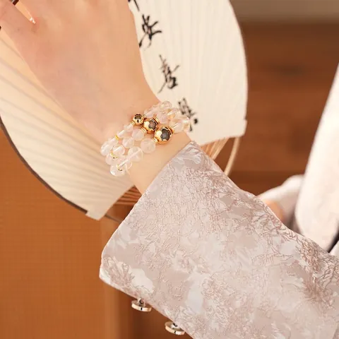 Natural White Crystal Beaded Bracelet With Golden Clover Heart Charm Elegant Handmade Elastic Jewelry For Women