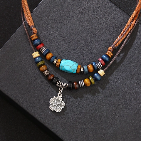 Collier Double Rang Avec Cordon Cire PU Perles En Bois Faux Turquoise Et Pendentif Fleur En Alliage Boho Ethnique Vintage