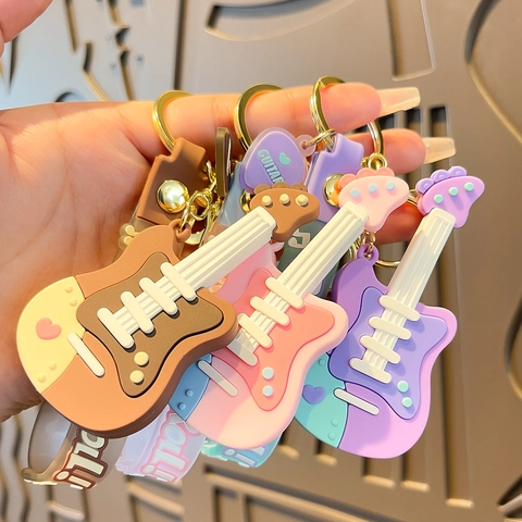 Gitarre Schlüsselanhänger Silikon PVC Musikinstrument Taschenanhänger Rock Roll Handschlaufe Cartoon Kreativ Schlüsselring