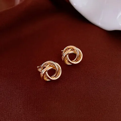 Minimalistische Gedrehte Knoten Creolen Für Damen Kupfer Metall Wicklung Hohl Geometrische Ästhetik Elegant Alltag Mode