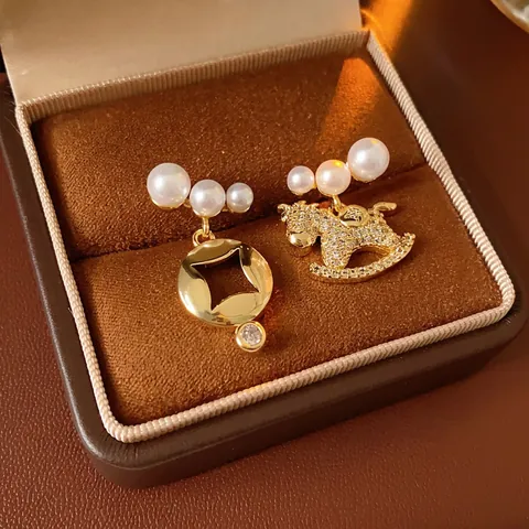 Asymmetric Rocking Horse Stud Earrings With Imitation Artificial Pearl And Zircon In Gold Plated Copper With Silver Earring Post