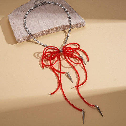 Rote Perlen Bogen Anhänger Halskette Mit Kupferkette Und Silbernen Spike Quasten Süßer Cooler Gotischer Schmuck Für Damen