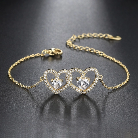 Bracelet Coeur Évidé Pour Femmes Élégant Coeurs Entrelacés Zircone Base En Cuivre Plaqué Or Bijoux Ajustables Cadeau