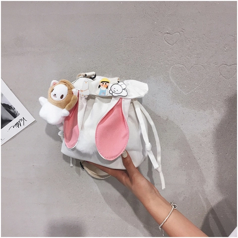 Lindo Bolso De Cubo De Lona Con Orejas De Conejo Estilo Japonés Kawaii Bolso De Hombro Con Cordón Con Pompon Y Insignias Para Mujeres