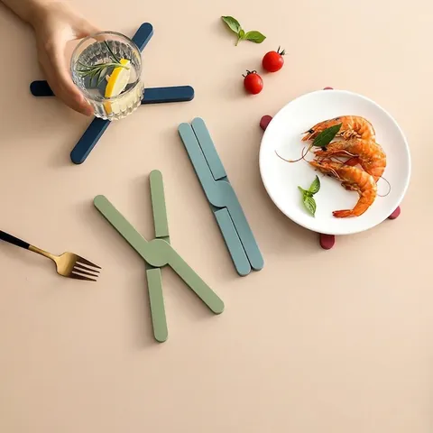 Sottopentola Pieghevole TPR Tappetino Isolante Resistente Al Calore Per Pentole Ciotole Piatti Antiscivolo A X Tavolo Cucina